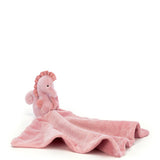A gentle gift for water-babies, it's Jellycat's Sienna seahorse soother! This coral-pink seahorse has a cordy mane and fins and the twirliest tail on the reef! Sienna is taking very good care of a sorbet-soft soother blanket with a satin ribbon. Perfect for beach trips or bedtimes!