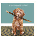 A cute and funny card showing a goldendoodle dog holsing a alrge stick in its mouth