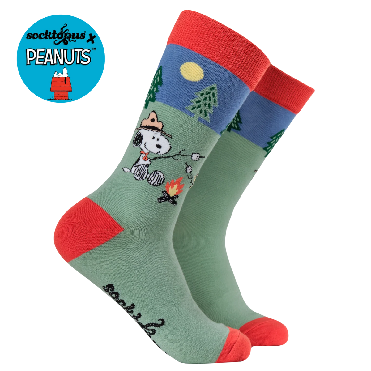 Official peanuts and snoopy socks from Socktopus featuring snoopy camping on a pale green background with red toes and heels 