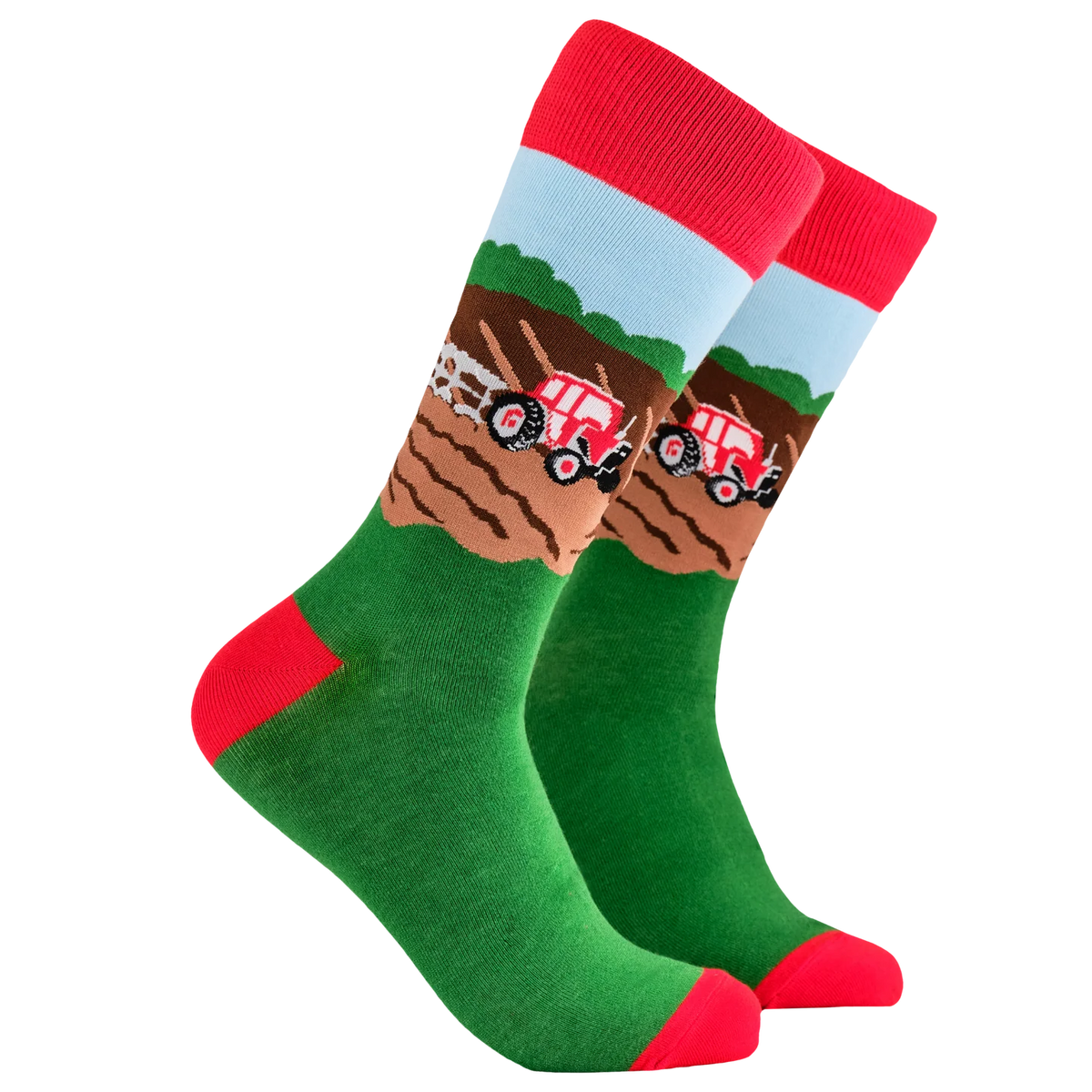 Bright green adult socks with red toes, heels and cuffs from Socktopus featuring a real countryside farming scene of a tractor working in a field