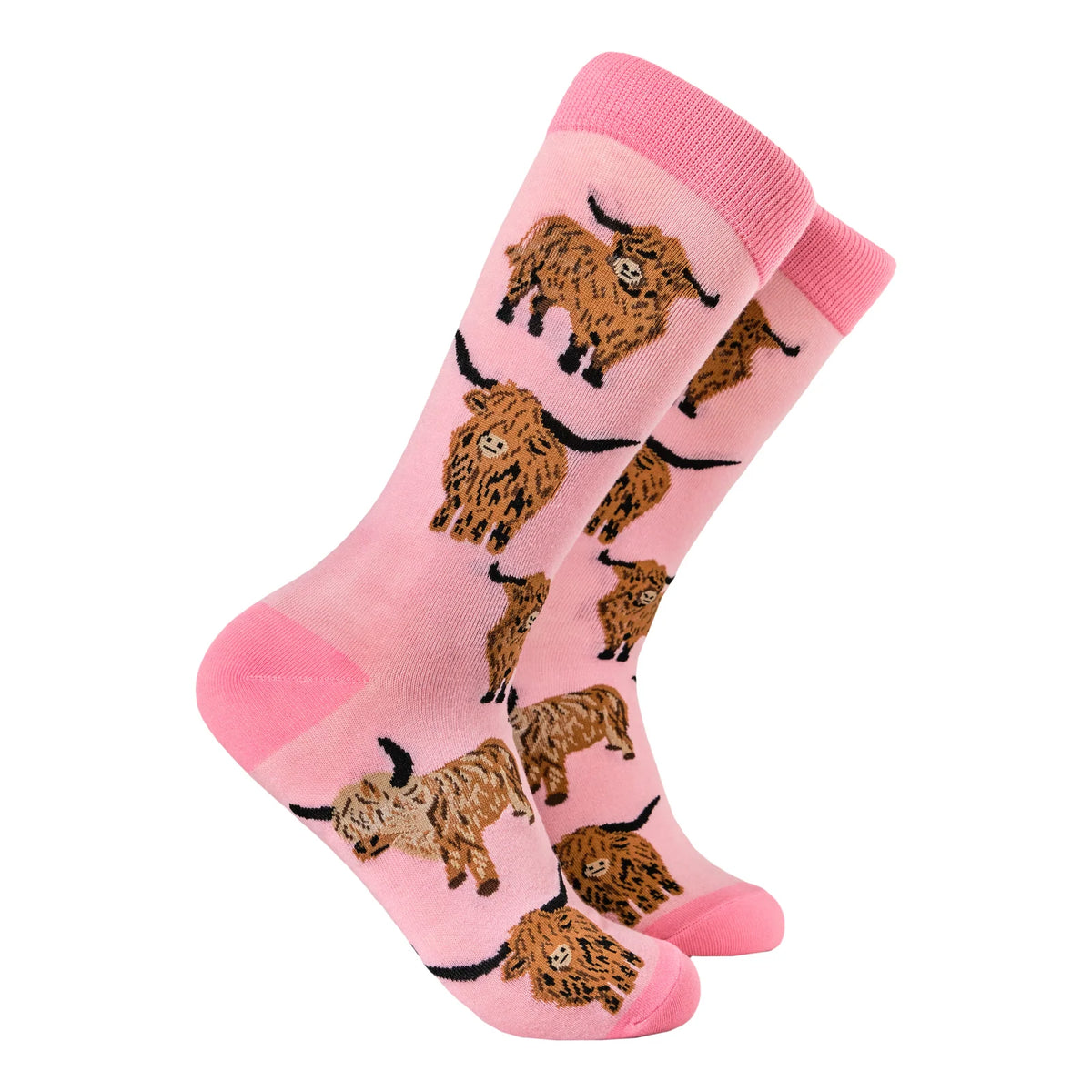 Pink adult crew socks from Socktopus featuring orange highland cows (coos)