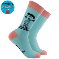 Light blue socks with pink accents featuring a character from Peanuts,saying “who says I’m crabby,”