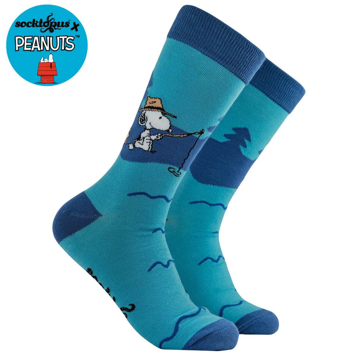 Blue adult crew socks from Socktopus featuring official snoopy and peanuts imagery of snoopy fishing 