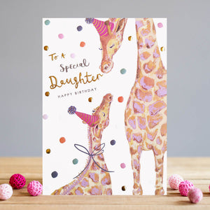 This special birthday card with artwork of a mother and baby giraffe is perfect for daughters of any age. The white background with polka dots gives it a cute, cheerful look, making it a beautiful way to say "Happy Birthday"! Text reads "To a special Daughter...Happy Birthday".