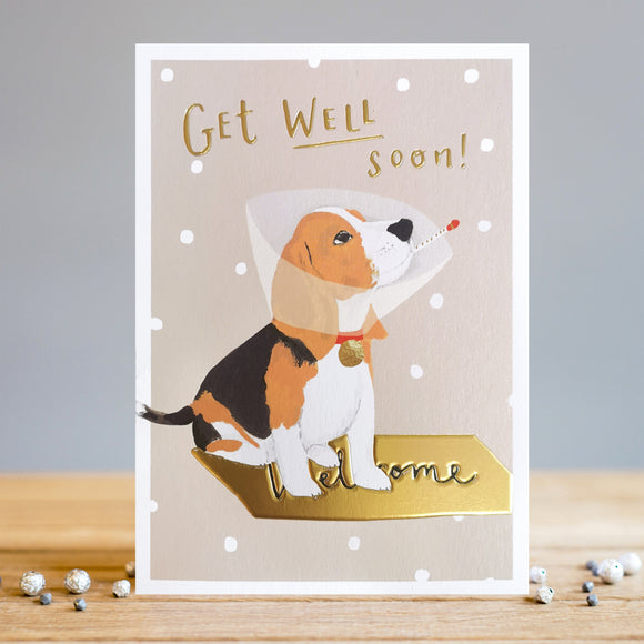 Send well wishes and warm thoughts with this heartfelt greeting! This stylish Louise Tiler get well soon card is decorated with a cute beagle dog wearing a cone-of-shame and with a thermometer in its mouth. Gold text on the front of the card reads 