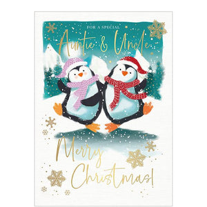 This adorable Christmas card for a special uncle and aunty is decorated with a pair of penguins - dressed in matching hats and scarves.

The caption on the front of this Christmas card reads "For a special Auntie &amp; Uncle...Merry Christmas".