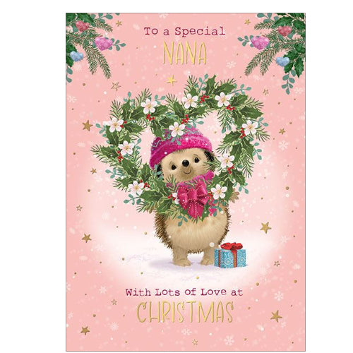 Here's Hartley the Hedgehog to wish a special nana a merry, snowy Christmas. Hartley is holding a heart shaped wreath of Christmas foliage whilst keeping warm with a pink woolly hat & scarf, against a pink background dotted with gold stars.

The caption on the front of this Christmas card reads 