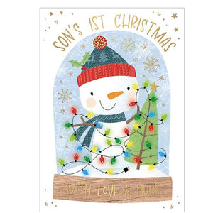 Celebrate a son's first Christmas with our fun Christmas card. Featuring a globe with a friendly snowman decorating a christmas tree with strings of coloured fairylights. Gold accents and details against a white background add a festive touch.&nbsp;

Gold text on the front of this Christmas card reads "Son's 1st Christmas with love and hugs".