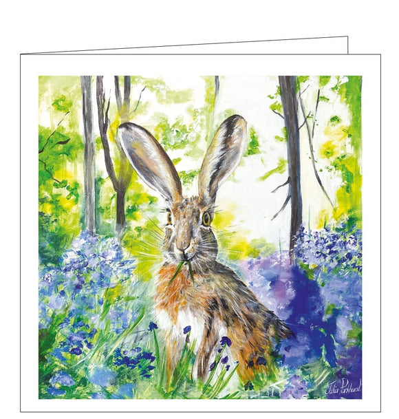 This lovely blank greetings card features detail from an artwork by Julia Pankhurst showing a brown hare sitting amongst the bluebell flowers.