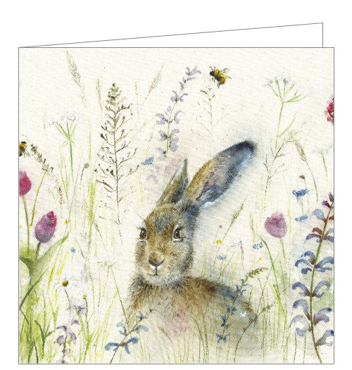 This lovely blank greetings card features artwork by Sarah Reilly showing a brown hare sitting among the wild flowers
