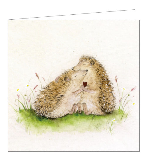 This lovely blank greetings card features detail from a watercolour artwork by Sarah Reilly showing two hedgehogs enjoying a cuddle with a small red heart between them. There is a short poem on the back.