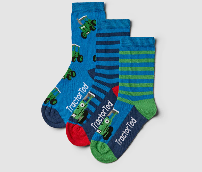 Three pairs of blue and green tractor Ted socks featuring tractors