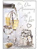 Celebrate your love with this elegant anniversary card from the popular Jonny Javelin collection. Featuring a sophisticated&nbsp;illustration of champagne being poured and beautifully wrapped gifts, this card perfectly captures the joy and romance of your special day.

Finished with shimmering silver-foiled text that reads: "On Our Anniversary With All My Love", it’s a heartfelt choice for expressing your love and appreciation to your partner.