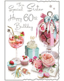 This Jonny Javelin sister 60th birthday card is decorated with a table laden with all good things for a birthday celebration - a cocktail, treats, cupcakes and presents.&nbsp; Silver text on the front of the card reads "To a Special Sister...Happy 60th Birthday." &nbsp;Touches of glitter add some shine, and the corner edges are shaped.