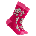Pink adult crew socks with poodle design on a pink background from socktopus