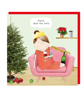 This&nbsp;Christmas card features one of&nbsp;Rosie's Made a Thing's unmistakably witty and charming illustrations showing a woman wearing a paper crown, taking a break from decorating the Christmas tree to relax on the sofa with a glass of wine. A speech bubble reads "Alexa, deck the halls".