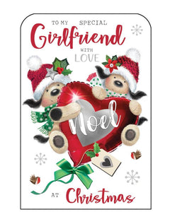 This Christmas card for a special girlfriend is decorated with two cute knitted dogs, dressed in hats and scarves, hanging on to a large, red festive heart-shaped balloon. Silver and glittery red text on the front of this Christmas card reads "To my special Girlfriend with love at Christmas".