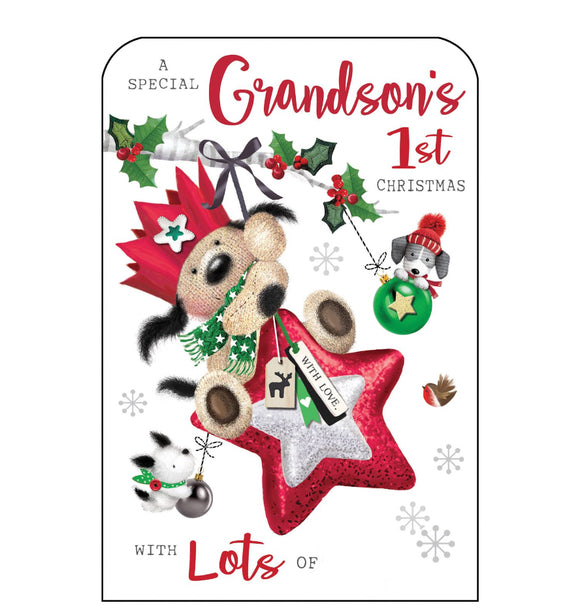 This Christmas card for a special grandson's first christmas is decorated with Fudge the dog riding on a star-shaped christmas tree bauble. Glittery red text on the front of this Christmas card reads 