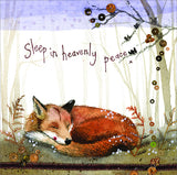Part of Alex Clark's Christmas card collection, this petite Christmas card is decorated with Alex's painting of a fox peacefully asleep in the woods as the snow starts to fall.. The text on the front of the card reads "Sleep in heavenly peace...".