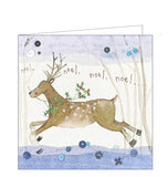 Part of Alex Clark's Christmas card collection, this petite Christmas card is decorated with Alex's painting of reindeer with antlers prancing across the front of the card with a sprig of holly in its mouth. The text on the front of the card reads "noel, noel, noel, noel...."