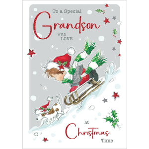 This cute Christmas card for a special grandson is decorated with an illustration of a young boy bundled up in a glittery red coat and scarf flying down a snowy hill on a sled. The white and glittery red text on the front reads "To a special Grandson at Christmas Time."