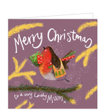 Part of Alex Clark's Christmas card collection, this Christmas card is decorated with Alex's painting of a robin marching along a fir-tree branch carrying rolls of wrapping paper and Christmas shopping bags. The text on the front of the card reads "Merry Christmas to a very lovely Mum x".