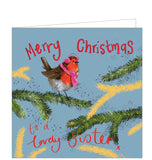 Part of Alex Clark's Christmas card collection, this Christmas card is decorated with Alex's painting of a robin perched on a fir-tree branch, wearing a pink knitted scarf and bobble hat. The text on the front of the card reads "Merry Christmas to a lovely Sister x".