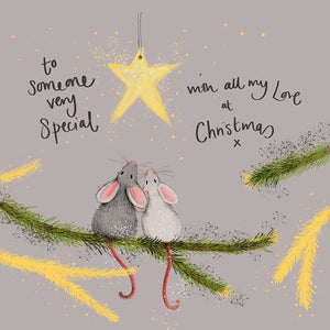 Part of Alex Clark's Christmas card collection, this Christmas card for someone special is decorated with Alex's painting of two cute mice sitting together on a Christmas tree branch looking up at a gold star decoration. The text on the front of the card reads "to someone very special with all my love at Christmas x".