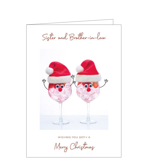This Christmas card for a special sister and brother-in-law features a photoshopped image of two wine glasses adorned with festive Santa hats and googly eyes along with a Rudolph-style red nose. The text on the front of the card reads 