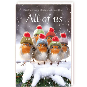 Perfect for sending to a much-loved family, this Christmas card is decorated with a photograph of a group of robins standing in the snow - each photoshopped to be wearing a tiny bobble hat.&nbsp;White text on the front of the card reads "Wishing you a Merry Christmas from All of us".