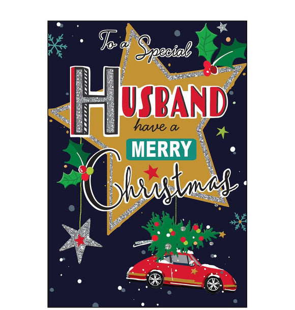 This bright and bold christmas card for a special husband is decorated with a red car shaped bauble - with a christmas tree on the roof - hanging from a large golden star. The text on the front of this Jonny Javelin Christmas card reads 