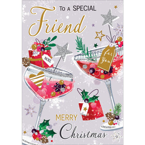 This stylish Jonny Javelin Christmas card is decorated with a pair of glittering pink cocktails, garnished with sprigs of winter foliage. Gold text on the front of the card reads "To a Special Friend...Merry Christmas".