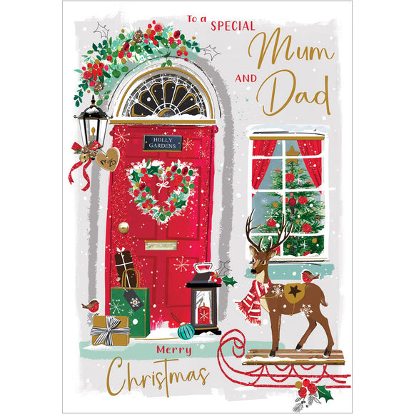 This Jonny Javelin Christmas card for a special dad and mum features a vibrant image of a red front door adorned with festive garlands and a heart-shaped wreath. A pile of beautifully wrapped gifts can be seen resting on the doorstep. Red and gold text on the front of this Christmas card reads 