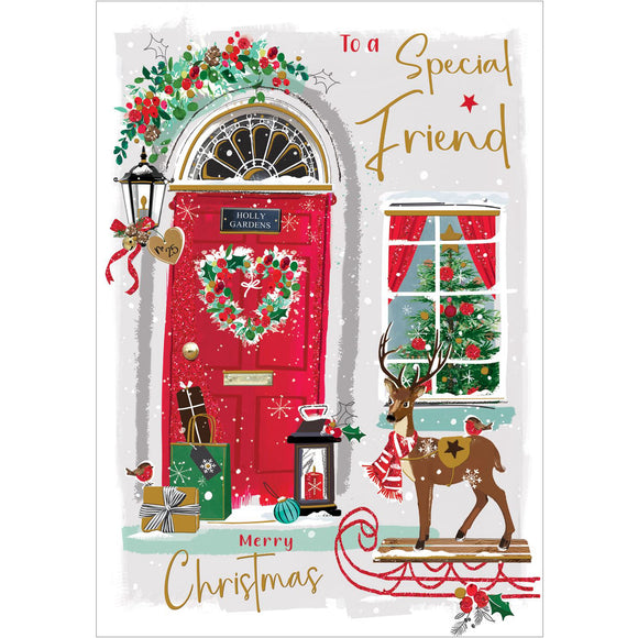 This Jonny Javelin Christmas card for a dear friend features a vibrant image of a red front door adorned with festive garlands and a heart-shaped wreath. A pile of beautifully wrapped gifts can be seen resting on the doorstep. Red and gold text on the front of this Christmas card reads 