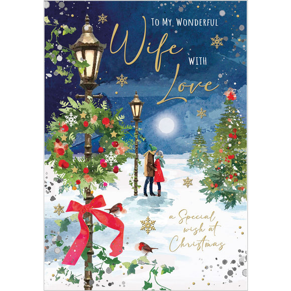 This stunning Jonny Javelin Christmas card for a special wife is decorated scene of a couple, wrapped up warmly against the cold and snow, paused to kiss under a victorian-style streetlamp. Gold text on the front of the card reads 