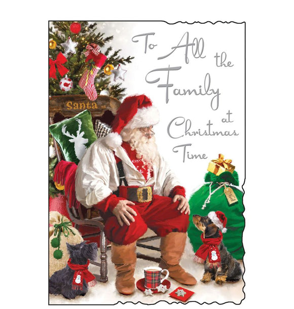 This Christmas card for a special family is decorated with a cute illustration of Father Christmas talking to a tiny little dachshund dog about what it would like for Christmas. Silver text on the front of this Christmas card reads 