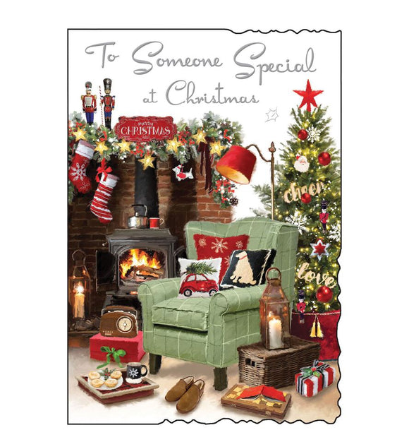 This Christmas card for a special someone is decorated with a cosy scene of an armchair ready and waiting by the fire - with slippers and mince pies to hand. Silver text on the front of this Christmas card reads 
