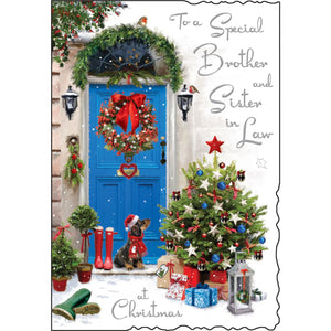 Send festive wishes to a special brother and sister-in-law with this elegant Jonny Javelin Christmas card, showing a scene of a blue front door, draped in festive garlands and wreaths. An adorable little dachshund dog in a bobble hat and scarf waits on the doorstep. Silver text on the front of the card reads "To a Special Brother and Sister in Law at Christmas".