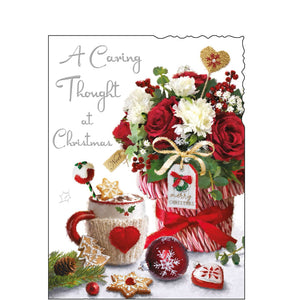 This Christmas card from Jonny Javelin is decorated with a lovely illustration of a vase of red and white flowers, together with a warm mug of hot chocolate, making it ideal for declaring your care and concern during a busy season. Silver text on the front of this Christmas card reads "A Caring Thought at Christmas".