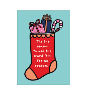 'Tis the season to spread cheer and laughter with this contemporary Christmas card! This card is decorated with a vividly colored cartoon stocking filled to the brim with presents and goodies. White text on the stocking reads "'Tis the season to use the word 'tis for no reason!"