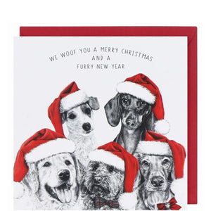 This Christmas card from Pigment Production's&nbsp;Life in Pencil&nbsp;card range is&nbsp;decorated with a black and white sketch&nbsp;of 5 different dog breeds all in Santa hats and looking indescribably cute. The&nbsp;caption on the front of the card reads "We woof you a Merry Christmas and a furry New Year."