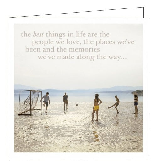 This cute greetings card features a photograph of a group playing football on the beach. The text on front reads 