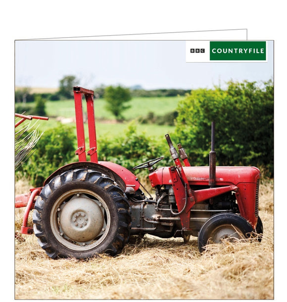 This blank card from the BBC Countryfile range features a photograph by of a red vintage Massey Ferguson tractor in a sunny field.