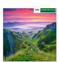 This blank card from the BBC Countryfile range features a photograph by Lee Howdle showing the sun setting in the Winnats Pass in the Derbyshire Peak District National Park.
