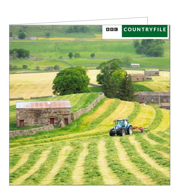 This blank card from the BBC Countryfile range features a photograph by of a blue  tractor harvesting silage in a field in Wensleydale, Yorkshire.