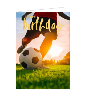 This birthday card is decorated with a photograph, taken from ground-level, of a footballer about to kick a football. Gold text on the card reads "Happy Birthday".