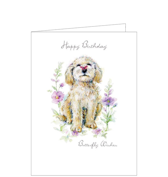 This birthday card shows an  adorable dog with a butterfly perched on his nose.