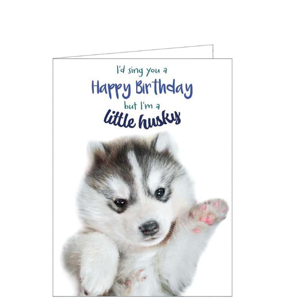 This funny birthday card is decorated with a photograph of a very cute husky puppy dog. The caption on the front of the card reads 