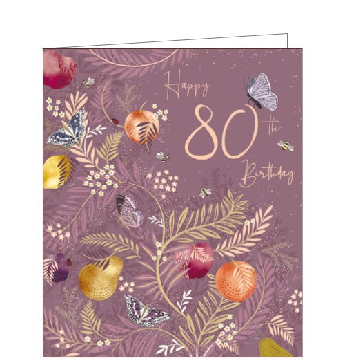 This gorgeous 80th birthday card is decorated with butterflies and fruits on golden branches against a dark pink coloured background.