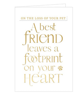 A simple white sympathy card embossed with gold text that reads "On the Loss of your pet. A best friend leaves a footprint on your Heart". There is a tiny pawprint too.